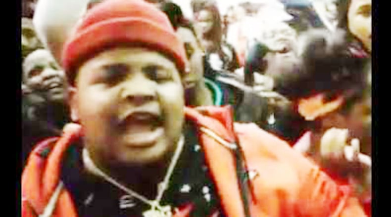 Guap Tarantino raps at Salem Middle School in Lithonia.