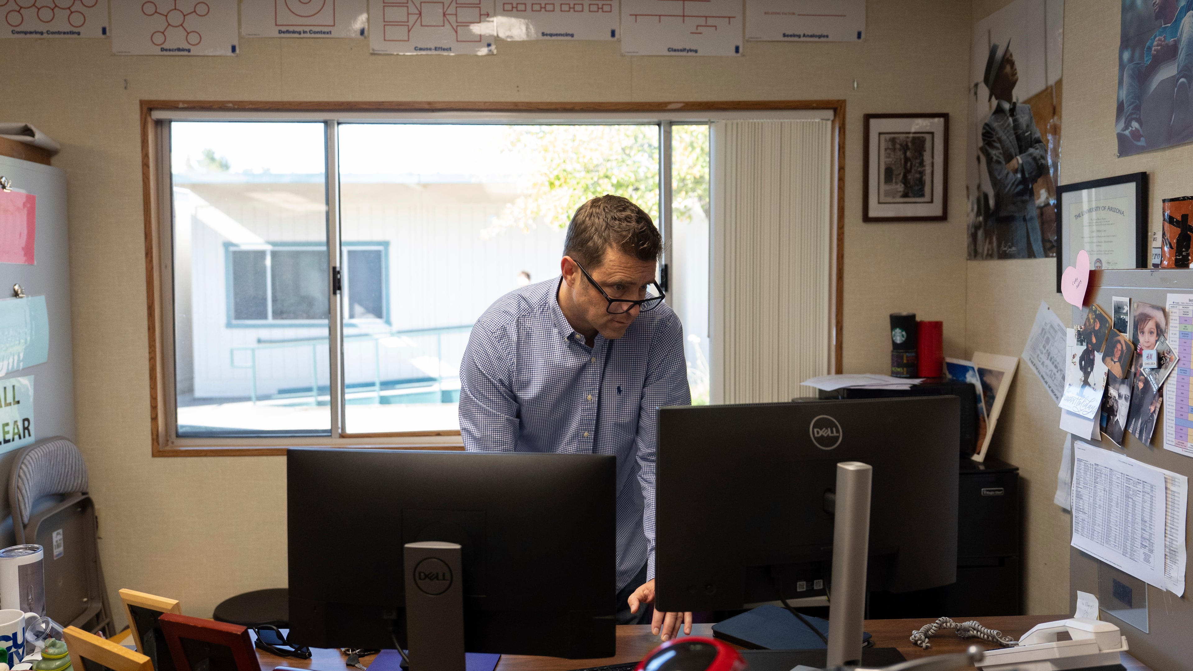 Casey Cuny, an English teacher at Valencia High School, works on his computer as he prepares for class in Santa Clarita, Calif., Wednesday, Aug. 27, 2025. (AP Photo/Jae C. Hong)