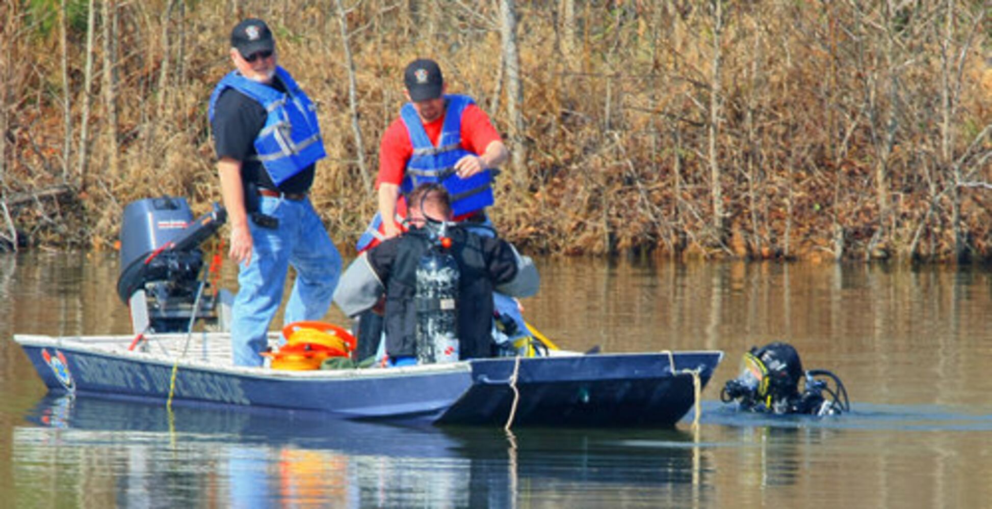 Crews search Carrollton crash site