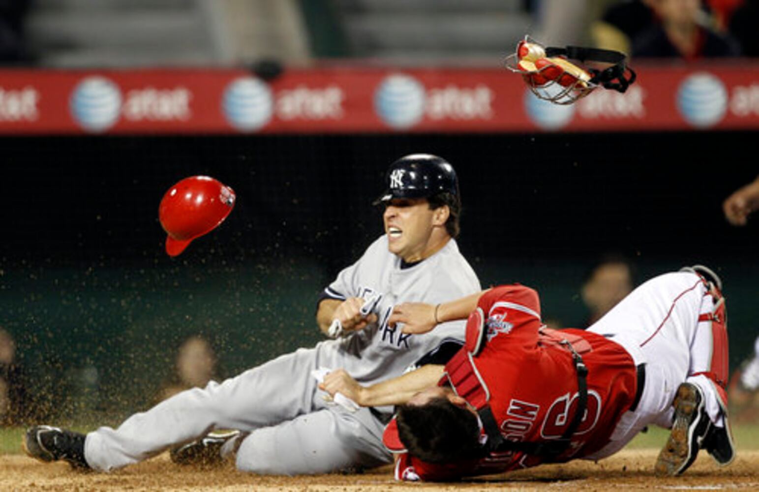 Catchers injured in home-plate collisions