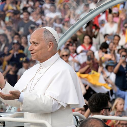 Pope Leo XIV makes a six-seven hand gestures as he arrives to attend a prayer vigil at Lluis Companys Olympic Stadium in Barcelona, Spain, Tuesday, June 9, 2026. (AP Photo/Bernat Armangue)