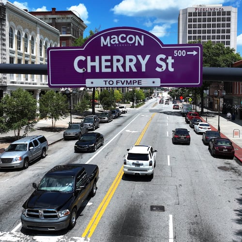 Street signs in downtown Macon now feature both English and Muscogee language names as part of an effort to honor the history and traditions of the area's original inhabitants. (Hyosub Shin/AJC)