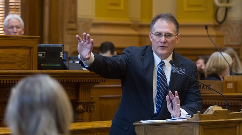 State Sen. William Ligon, R-Brunswick, talks before Friday’s vote on Senate Bill 375 in the state Capitol in Atlanta. Senate Bill 375 would allow adoption agencies to refuse to place children with same-sex families. STEVE SCHAEFER / SPECIAL TO THE AJC