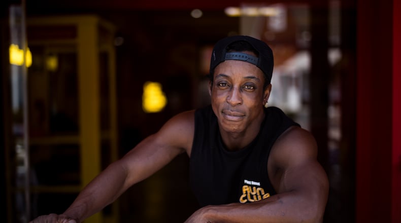 Shaka Smith, a vegan influencer who's politically an independent, poses for a portrait at his fast-food restaurant in Santa Monica, Calif., Thursday, Aug. 6, 2026. (AP Photo/Jae C. Hong)