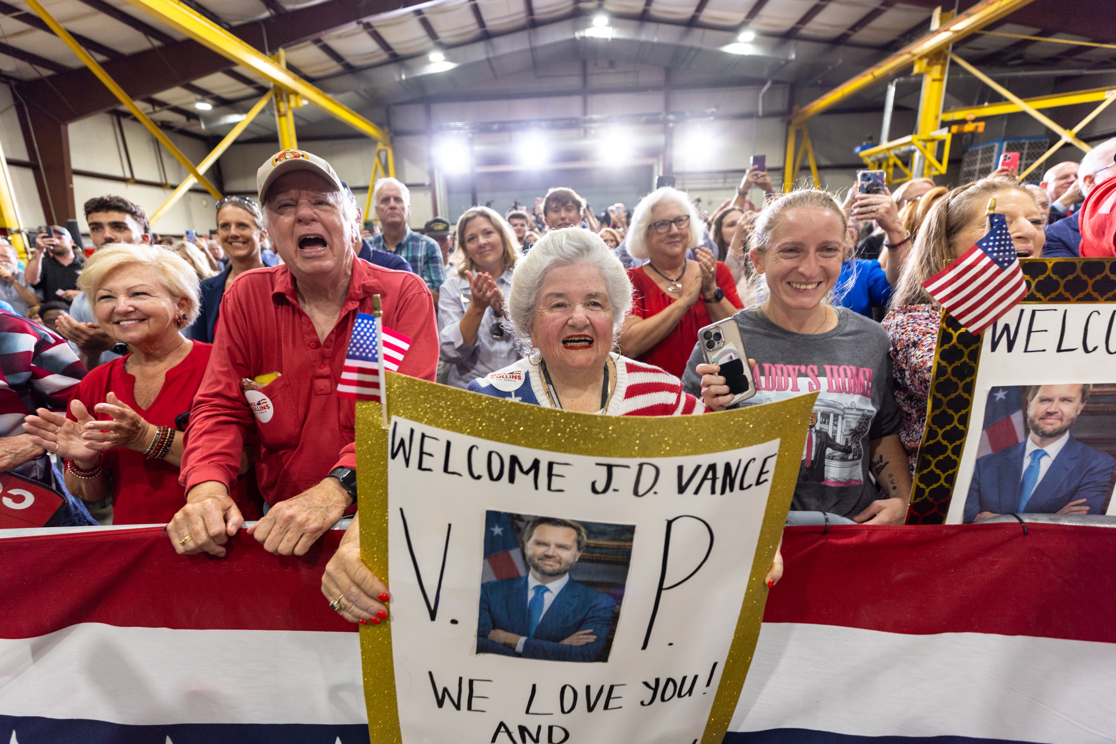 Supporters, including Nancy Burton (center), cheer as Vice President JD Vance speaks at ALTA Refrigeration in Peachtree City on Thursday, August 21, 2025. (Arvin Temkar/AJC)