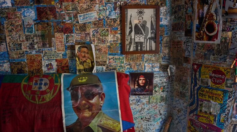 Images of Raul Castro, Che Guevara and Jose Marti decorate a wall in a souvenir shop in Havana, Tuesday, June 2, 2026. (AP Photo/Ramon Espinosa)