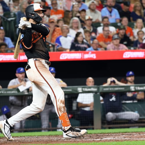 Baltimore Orioles' Dylan Beavers hits an RBI single during the ninth inning of a baseball game against the Atlanta Braves, Saturday, July 25, 2026, in Baltimore. (AP Photo/Daniel Kucin Jr.)