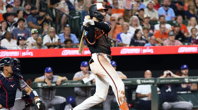 Baltimore Orioles' Dylan Beavers hits an RBI single during the ninth inning of a baseball game against the Atlanta Braves, Saturday, July 25, 2026, in Baltimore. (AP Photo/Daniel Kucin Jr.)