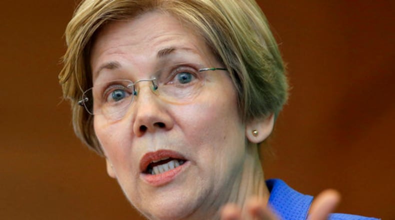 FILE- In this March 27, 2017, file photo, U.S. Sen. Elizabeth Warren, D-Mass., addresses business leaders during a New England Council luncheon in Boston.  Warren is revving up her already formidable fundraising juggernaut, raking in more than $5.2 million in the first quarter of the year to bring her campaign account to more than $9.2 million according to fundraising totals released Wednesday, April 12, by her campaign. (AP Photo/Steven Senne, File)
