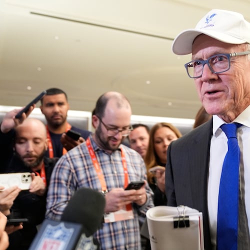 New York Jets owner Woody Johnson talks to reporters before attending an NFL owners meeting in New York, Tuesday, Oct. 21, 2025. (AP Photo/Seth Wenig)