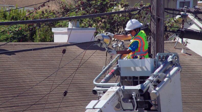 AT&T, Comcast and EarthLink say Internet speeds are holding up as more people work and study from home, but industry data says the network is starting to feel the strain. FILE PHOTO