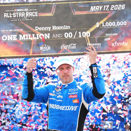 Denny Hamlin celebrates in Victory Lane after winning the NASCAR All-Star auto race at Dover Motor Speedway, Sunday, May 17, 2026, in Dover, Del. (AP Photo/Derik Hamilton)