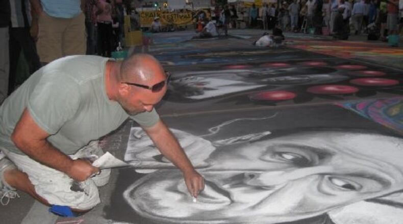 David Lepore of West Palm Beach, Fla., is one of more than 40 national chalk artists who will be creating works this weekend at Marietta ChalkFest. He David prefers to depict iconic heroes and villains, using movie clips as inspiration.