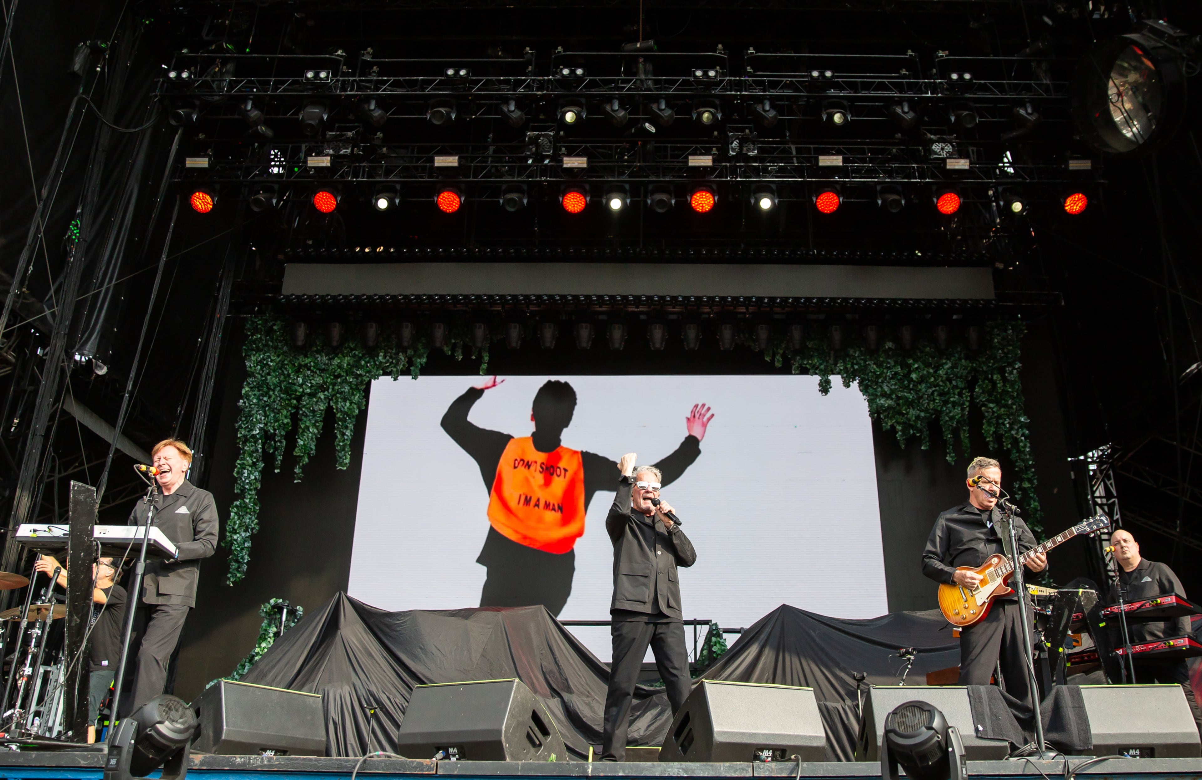 Atlanta, Ga. — New wave legends Devo took the Peachtree Stage and played classics like "Whip It" for adoring fans on Sunday, Sept. 21, 2025, at Piedmont Park. (RYAN FLEISHER FOR THE ATLANTA JOURNAL-CONSTITUTION)