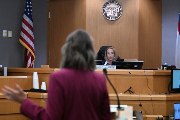 Trinity Hundredmark, one of Deja Coleman's attorneys (foreground) speaks before Gwinnett County Superior Court Judge Tamela Adkins during Coleman's bond hearing on Wednesday, Sept. 9, 2026. (Hyosub Shin/AJC)