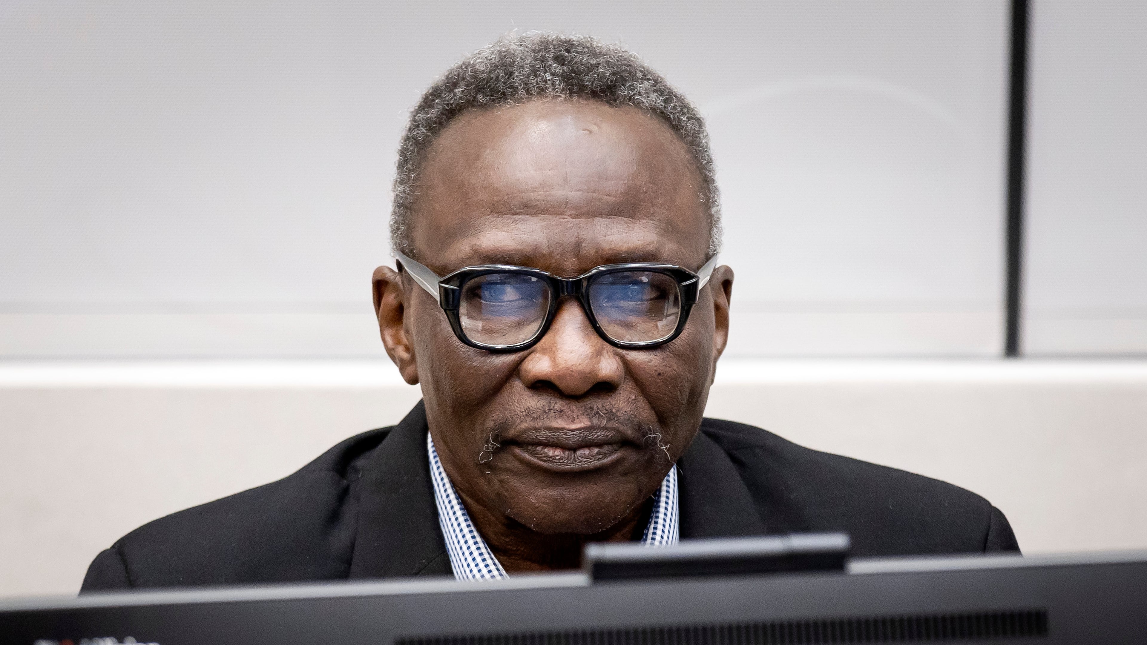FILE - Ali Muhammad Ali Abd al-Rahman, a Sudanese national, during a hearing at the International Criminal Court in The Hague, The Netherlands, Thursday, Oct. 19, 2023. (Koen van Weel/Pool Photo via AP, File)