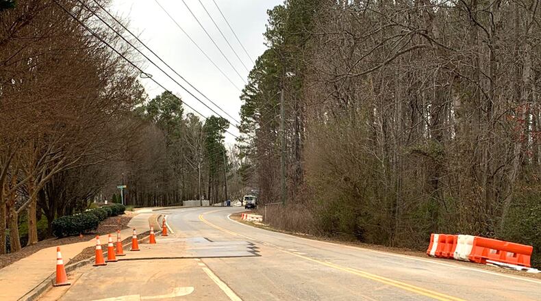 Metal plates are a temporary fix at the site of a water main break on Bethany Bend in Milton.
