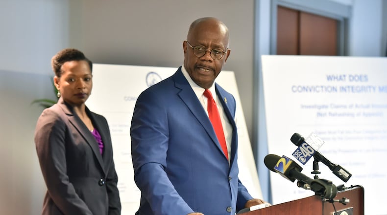 Fulton County District Attorney Paul Howard speaks as Melissa Redmon (left), a University of Georgia School of Law professor, listens during a news conference to announce the creation of a Conviction Integrity Unit at the Fulton County district attorney’s office on Tuesday, May 7, 2019. Redmon will serve as a consultant to the Conviction Integrity Unit.