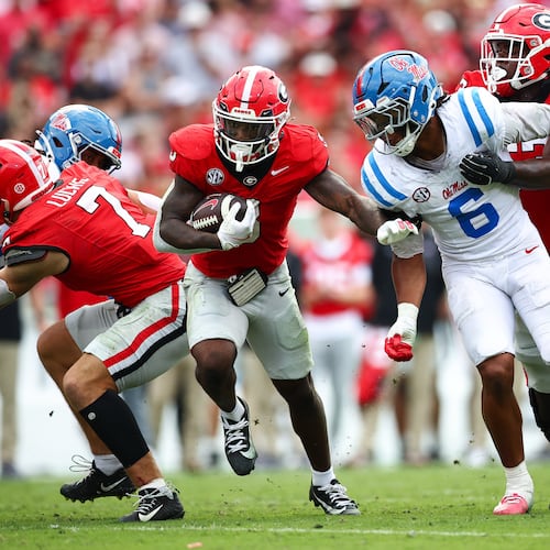 FILE - Georgia running back Nate Frazier (3) runs with the ball during the first half of an NCAA college football game against Mississippi, Saturday, Oct. 18, 2025, in Athens, Ga. (AP Photo/Colin Hubbard, File)