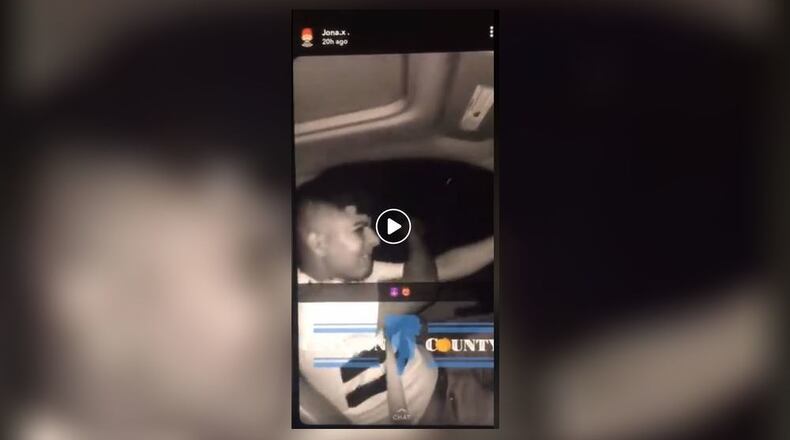A video posted to Snapchat Saturday night appears to show two men fire several shots out of a moving vehicle in Clayton County.