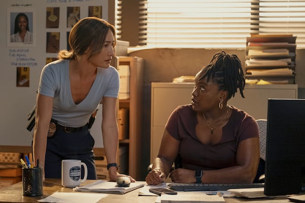 This image released by Amazon Prime shows Maggie Q, left, and Courtney Taylor in a scene from the series "Ballard." (Adam Rose/Prime Video via AP)