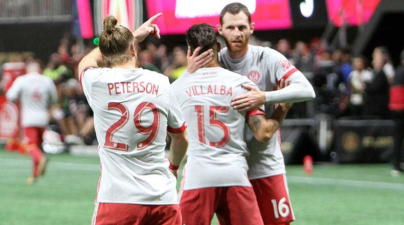 Atlanta United players celebrate during Wednesday's game. (Miguel Martinez/MundoHispanico)