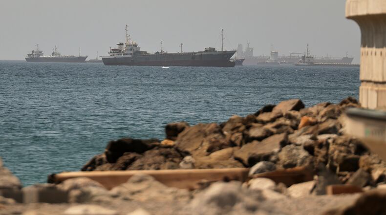 Tankers and cargo vessels are seen in the Gulf of Oman, along shipping routes linking the Strait of Hormuz and the Arabian Sea, Tuesday, June 16, 2026. (AP Photo)
