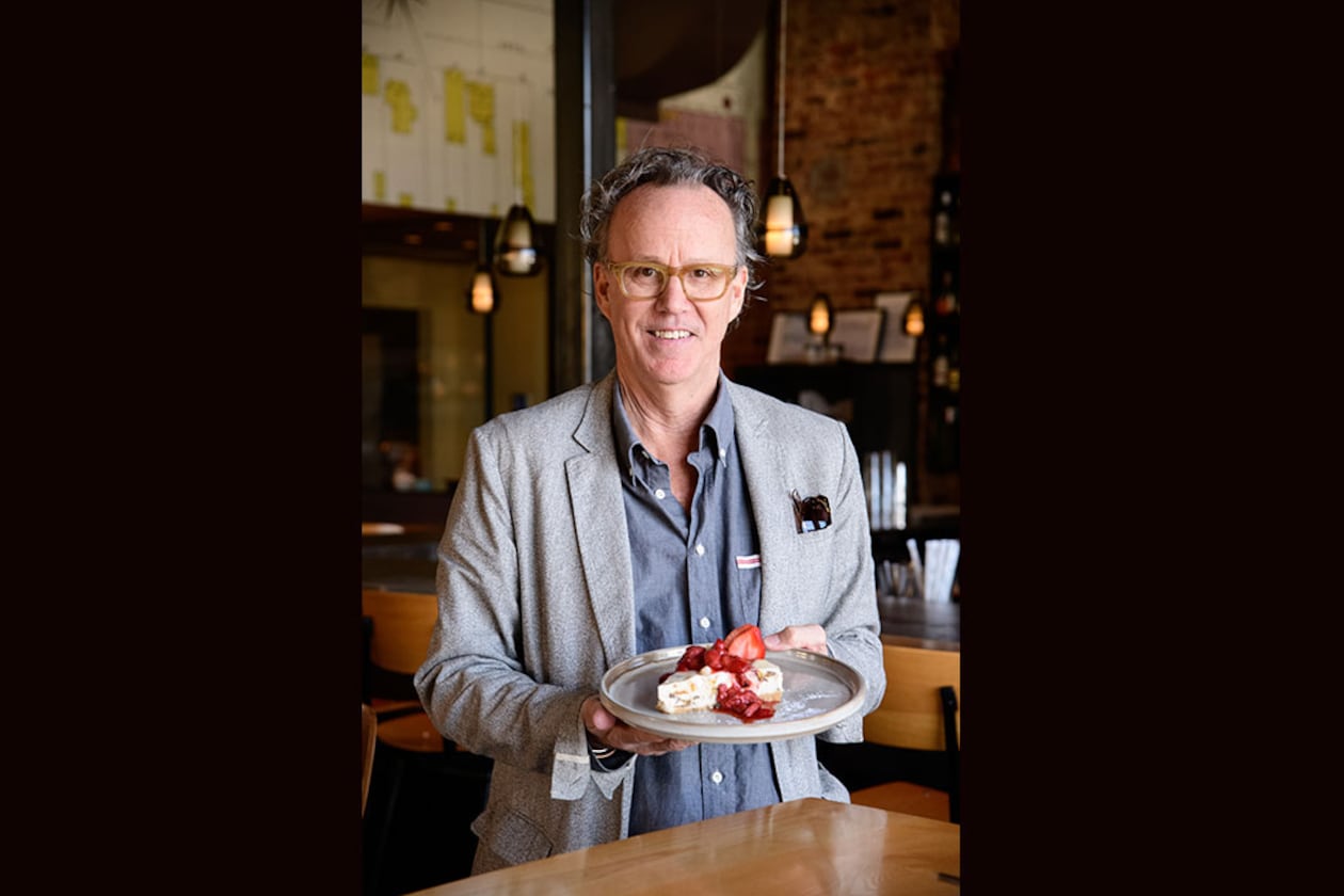 Rob Gentry, the owner of Hey Monty in Chattanooga, holds a slice of his no-bake MoonPie cheesecake. / Photo by Mark Gilliland