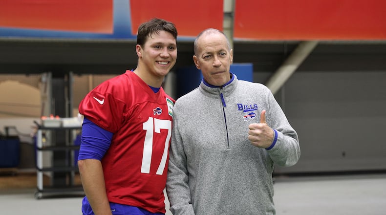 Former Bills quarterback and Hall of Famer Jim Kelly visits with Buffalo's top draft pick, Josh Allen after rookie camp. Kelly is coming back from another cancer surgery.