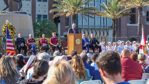 The day after an active shooter on campus Florida State president Richard McCullough addresses a vigil on campus at Langford Green, Tallahassee, Fla., Friday, April 18, 2025. (AP Photo/Gary McCullough)