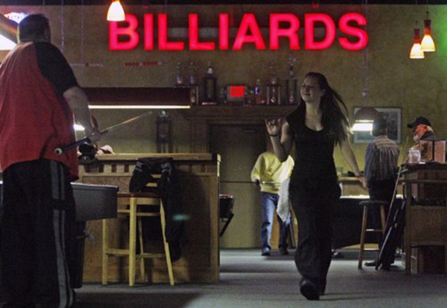 Pool hall offers solace in tough times