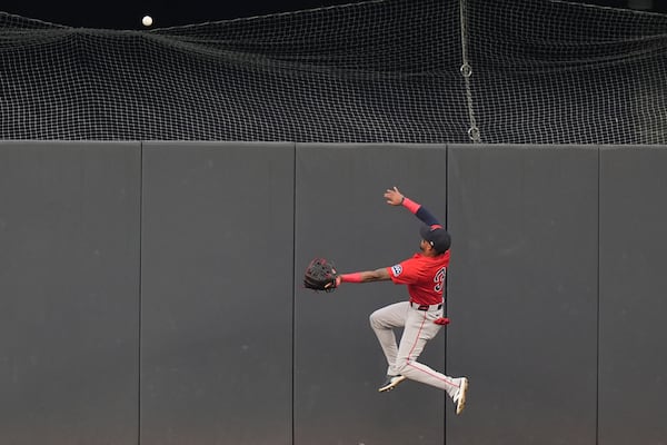 Boston Red Sox's Ceddanne Rafaela (3) chases a ball hit by New York Yankees' Jazz Chisholm Jr. for a three-run home run during the first inning of a baseball game, Friday, June 6, 2025, in New York. (AP Photo/Frank Franklin II)