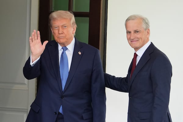 President Donald Trump greets Norwegian Prime Minister Jonas Gahr Støre, upon his arrival at the White House, Thursday, April 24, 2025, in Washington. (AP Photo/Alex Brandon)