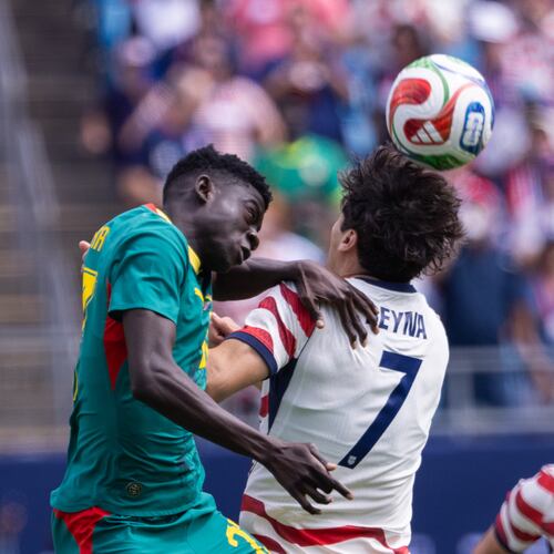 Senegal midfielder Bara Ndiaye (left) and United States midfielder Giovanni Reyna (7) head the ball during the first half of an international friendly Sunday, May 31, 2026, in Charlotte, North Carolina. (Scott Kinser/AP)