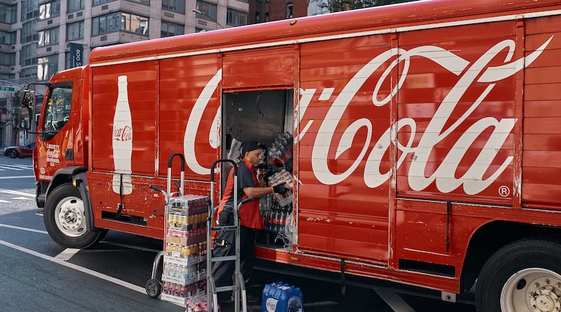 After weathering a year of inflation, Atlanta-based Coca-Cola reported better-than-expected earnings Wednesday.  The company said it expects the rest of the year to be strong.  (Andres Kudacki/The New York Times)