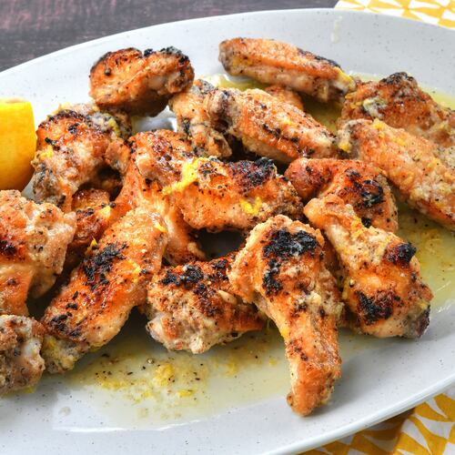 Host a crowd on Super Bowl Sunday with these 30-minute Lemon Pepper Wet Chicken Wings. (Chris Hunt for the AJC)