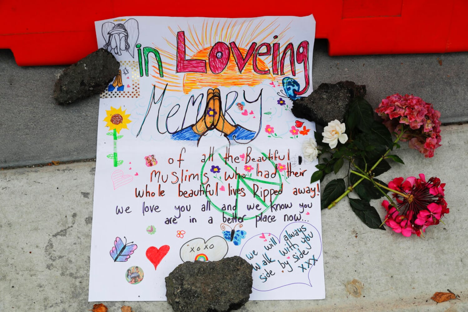 Photos: Memorials honor New Zealand mosque shooting victims