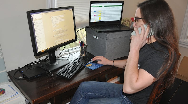 Tedi Milgrom, a contact tracer for the health department in Washtenaw County, Michigan, calls a person who may have been exposed to the coronavirus. Milgrom and her colleagues have been overwhelmed by a surge in covid-19 cases over the past month. (Nicola Milgrom)