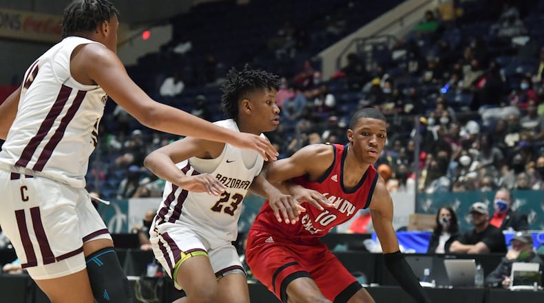 March 12, 2021 Macon - Sandy Creek's Jabari Smith (10) dribbles against Cross Creek's Antoine Lorick (23) during the 2021 GHSA State Basketball Class AAA Boys Championship game at the Macon Centreplex in Macon on Friday, March 12, 2021 Cross Creek won 57-49 over Sandy Creek. (Hyosub Shin / Hyosub.Shin@ajc.com)