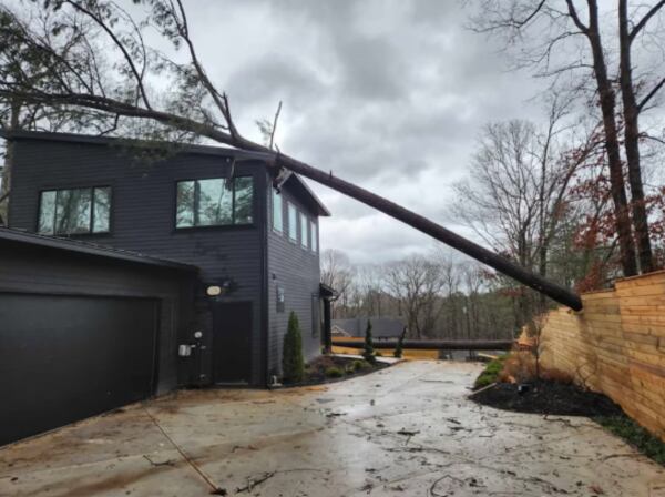 A tree fell on a home on Pine Hill Drive in Douglas County during early Sunday storms.
