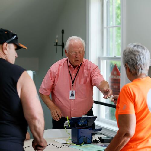 Michael Parnow, a poll manager at Canton City Hall, assists voters at the Riverr-Green subdivision in Canton during the special election for the state senate seat in Cherokee on Tuesday, August 26,2025, to complete the term of former state Sen. Brandon Beach, which runs through January 2027.
(Miguel Martinez/ AJC)