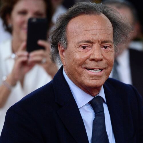 FILE - Spanish singer Julio Iglesias smiles during his star unveiling ceremony at the Walk of Fame in San Juan, Puerto Rico, Thursday, Sept. 29, 2016. (AP Photo/Carlos Giusti, file)
