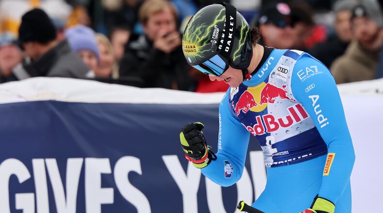 Italy's Giovanni Franzoni at the finish area of a men's alpine ski World Cup downhill, in Kitzbuehel, Austria, Saturday, Jan. 24, 2026. (AP Photo/Marco Trovati)