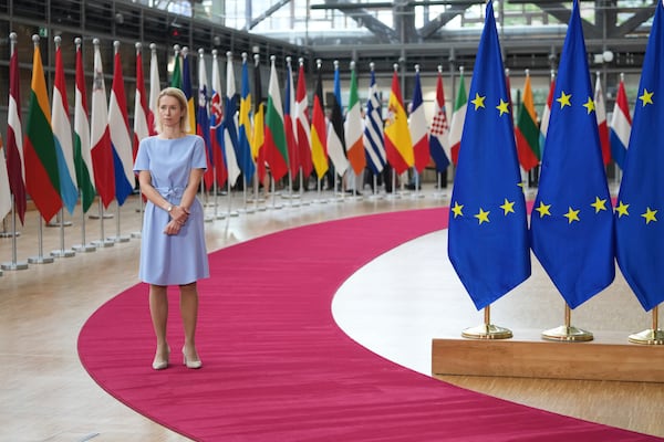 European Union foreign policy chief Kaja Kallas waits for a standup space as she arrives for a meeting of EU foreign ministers at the European Council building in Brussels, Monday, June 23, 2025. (AP Photo/Virginia Mayo)