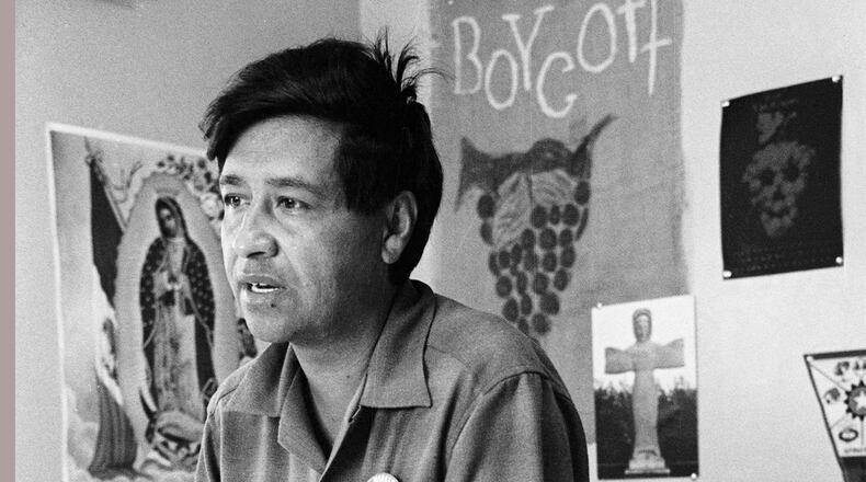 FILE - Cesar Chavez, a farm worker, labor organizer and leader of the California grape strike, is seen in a California works office in 1965. (AP Photo, George Brich, File)