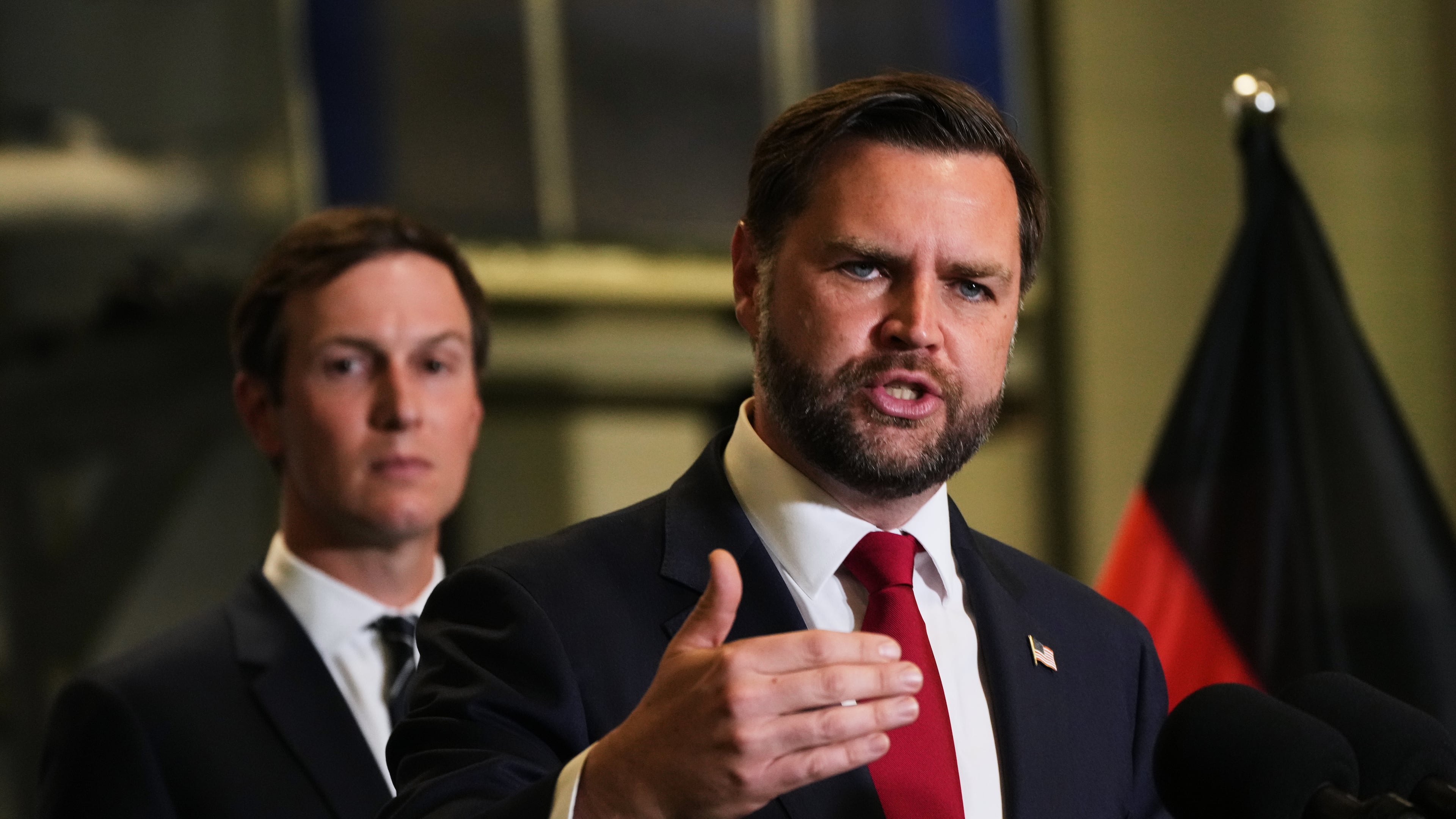 U.S. Vice President JD Vance speak to the media as Jared Kushner looks on, in Kiryat Gat, Israel, Tuesday, Oct. 21, 2025. (AP Photo/Francisco Seco)
