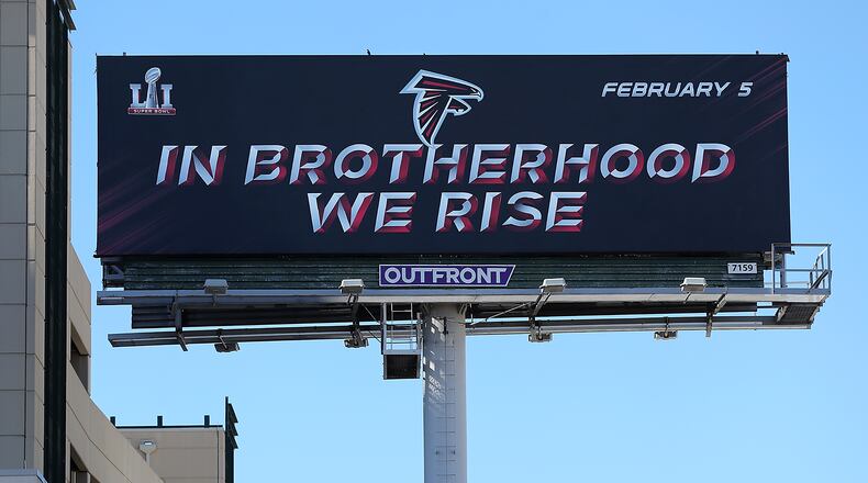 There is little doubt who owns this area just outside of Houston's city center - it's written all over the billboard beside the Falcons team hotel. (Curtis Compton/ccompton@ajc.com)