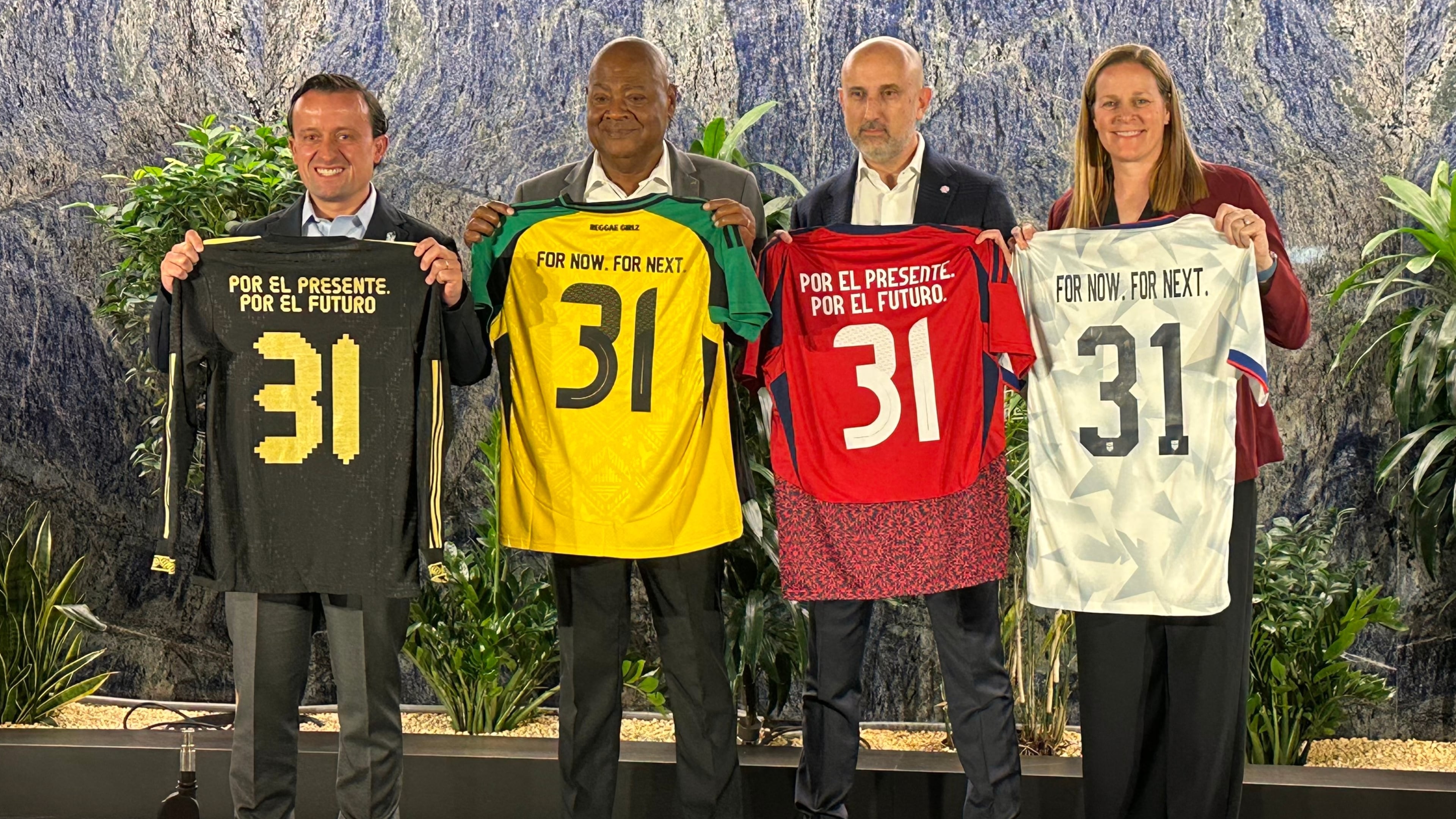 From left to right, Mexican Football Federation president Mikel Arriola, Jamaica Football Federation president Michael Ricketts, Costa Rican Football Federation president Osael Maroto Martínez and U.S. Soccer president Cindy Parlow Cone pose with jerseys at a news conference in New York, Monday, Oct. 20, 2025, to announce the four nations had joined a proposal to co-host the 2031 Women's World Cup, the only bid being considered by FIFA. (AP Photo/Ron Blum)