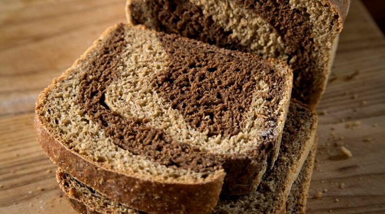 Cocoa powder is used to make the darker dough for marble rye. (Jerry Holt/Minneapolis Star Tribune/TNS)