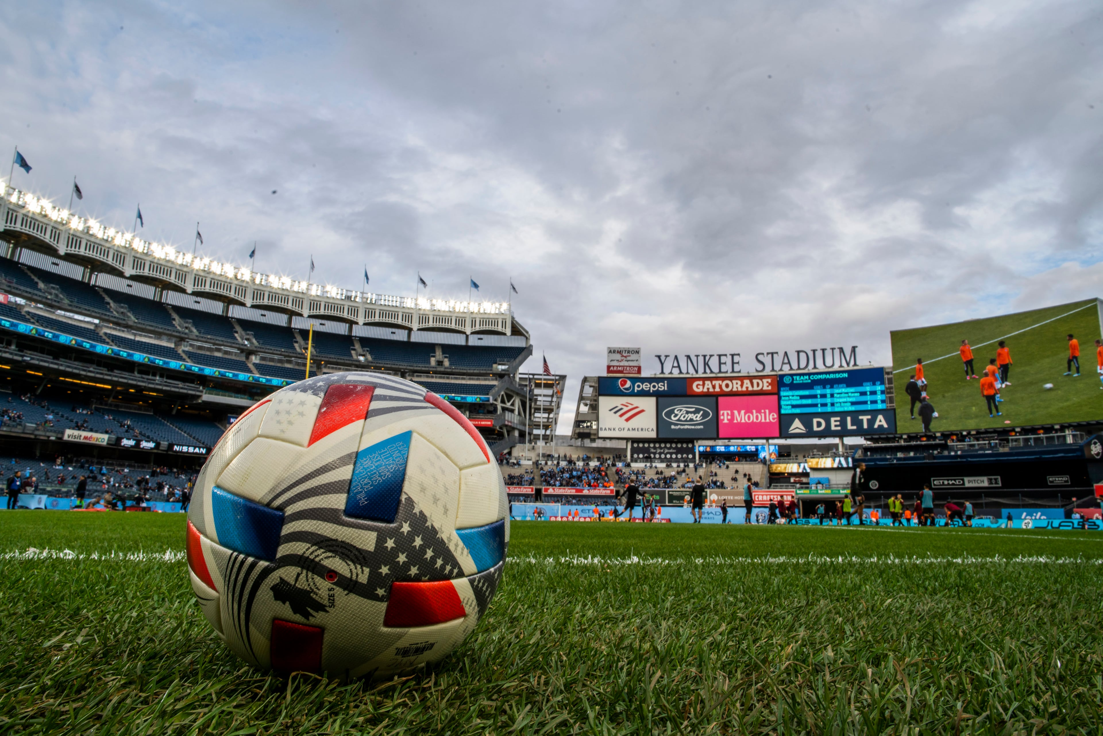 Players for New York City FC and Atlanta United warm up before an MLS soccer match at Yankee Stadium, 2021, in New York. (Eduardo Munoz Alvarez/AP)